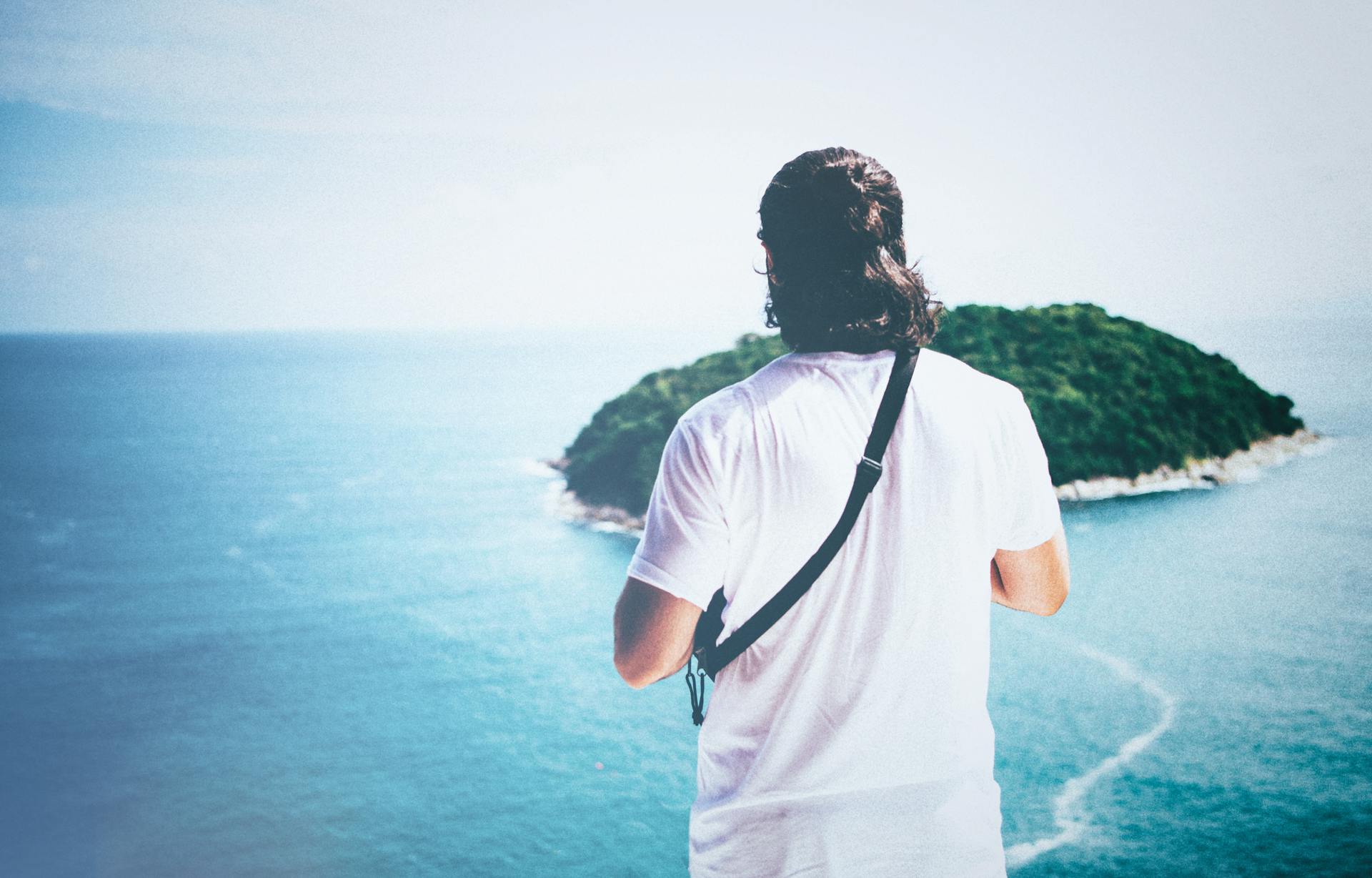 Guide explaining island history (caption: “Learn Phi Phi’s rich past with expert guidance